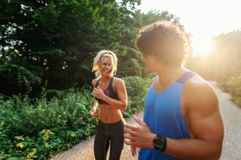 Two runners jogging together at an easy, conversational pace